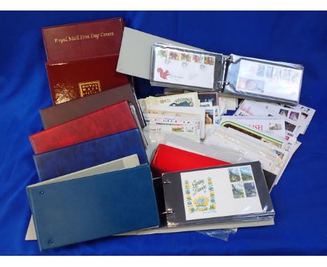 A COLLECTION OF FIRST DAY COVERS, IN ALBUMS covers with coins, and others