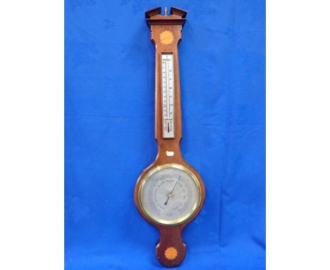 A REPRODUCTION MAHOGANY WHEEL PATTERN BAROMETER BY RUSSELL OF NORWICH 92cm high 