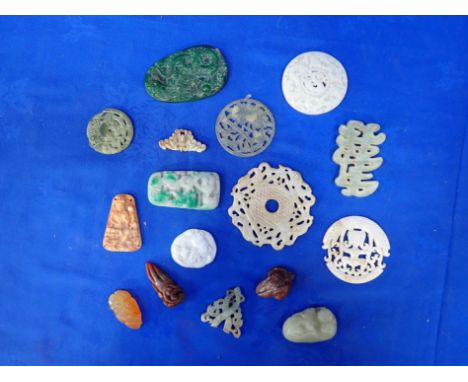 A COLLECTION OF 'JADEITE' AND HARDSTONE CARVINGS including a pale jade carved figure of a boy and girl lying together 6cm wid