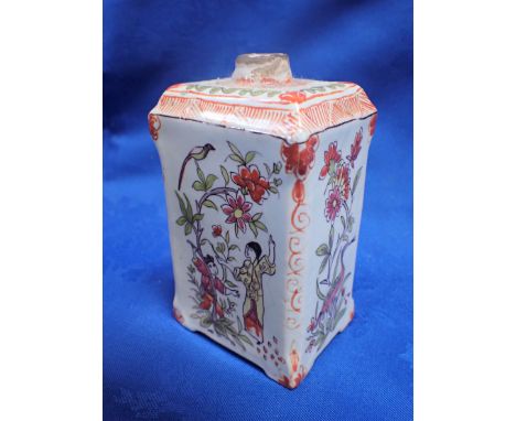 A TIN-GLAZED 'DELFT' CADDY with poychrome decoration 12cm high
