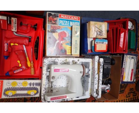 A MECCANO JIG-SAW PUZZLE MAKER (BOXED) a Meccano/Jones Lockstitch sewing machine, other Meccano tools and accessories, and a 