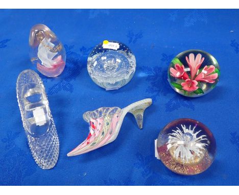 A CAITHNESS PAPERWEIGHT, THREE OTHER PAPERWEIGHTS a Venetian glass slipper, and a cut-glass shoe