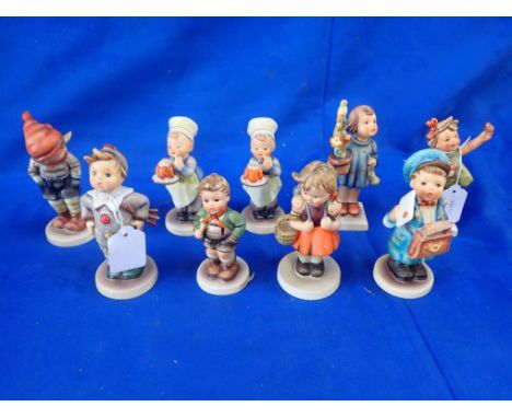 A COLLECTION OF GOEBEL HUMMEL FIGURES 'Trumpet boy' 'Carnival' and others (9)