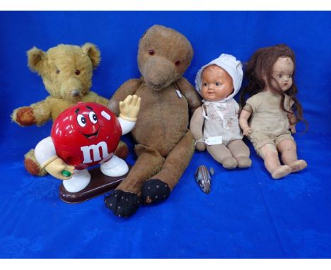 A VINTAGE TEDDY BEAR together with another, two dolls and others