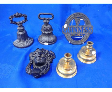A CAST-IRON GREEK REVIVAL DOOR KNOCKER two similar Victorian doorstops, and a pair of reproduction Swedish Vasa Museum candle