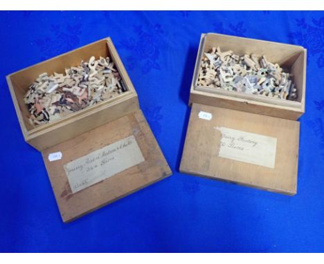 TWO VINTAGE JIGSAW PUZZLES contained in plywood boxes, the lids worded respectively 'Young Maori Matron &amp; Child' and 'Fai