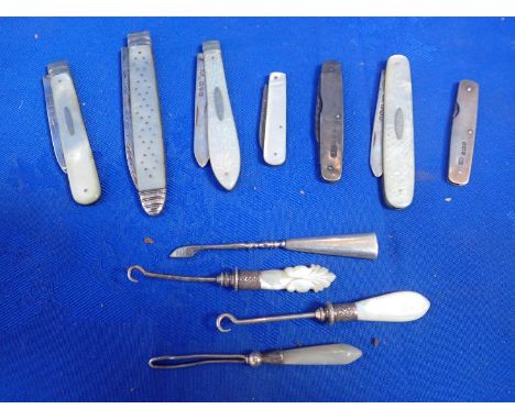 A COLLECTION OF SILVER AND MOTHER-OF-PEARL KNIVES and other items