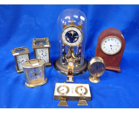 A EDWARDIAN BRASS REPEATING CARRIAGE CLOCK (for restoration) the white enamel dial with black Roman numerals and dark blue st