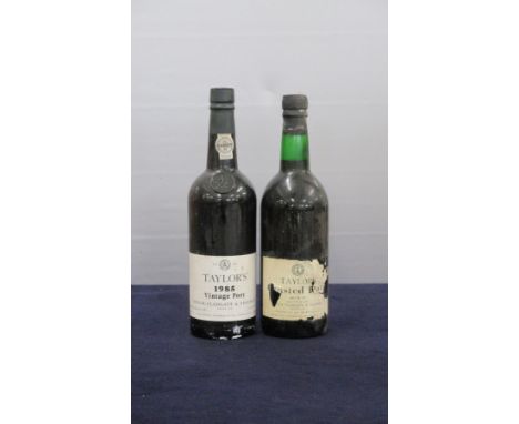 1 bt Taylor's Vintage Port 1985 1 bt Taylor's Crusted Port NV, bottled 1974, i.n, sl torn/pt dis Above two bottles 