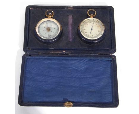 First quarter of 20th century pocket watch compass along with a pocket barometer in fitted blue display case