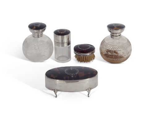 Matched five-piece silver encased/mounted and tortoiseshell lidded dressing table set comprising two spherical cut glass scen