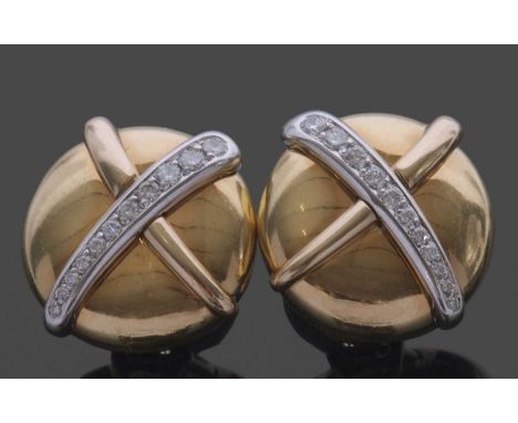 Pair of Werner Zappe diamond set earrings, a stylised button design, each applied with a graduated diamond set band over a pl