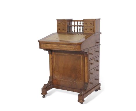 Victorian Walnut veneered davenport desk with small top section, four drawers and galleried centre over a sloped writing surf