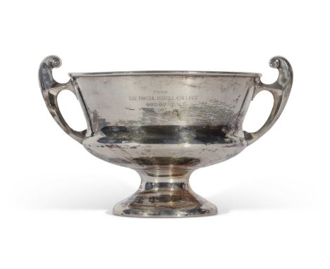 Edwardian large two-handled Silver presentation pedestal bowl with swept handles. Inscribed 'The officers first Batt. Royal F