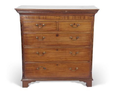 George III mahogany chest of drawers with moulded and dental cornice over a band with inlaid shell decoration and two short a