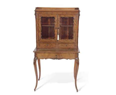 Victorian walnut veneered ladies writing desk formed of two sections, the top section with galleried shelf over two glazed do