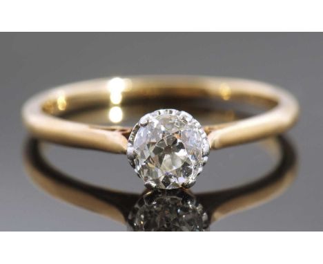 Single stone diamond ring, the old cut diamond 0.040ct approx, raised between upswept shoulders, finger size N, tested for 18