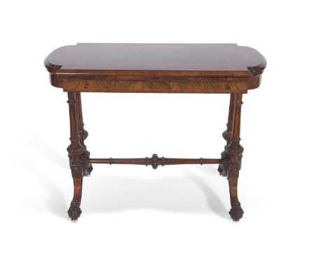 Victorian walnut veneered and inlaid card table with folding and revolving top raised on four tapering supports with cross st