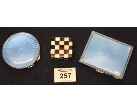 A silver and blue guilloche enamel compact and matching cigarette case and a small box. (B.P. 24% incl. VAT)