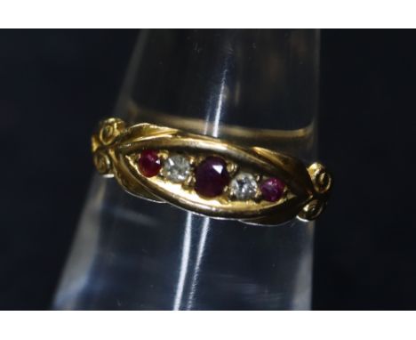 A 9ct gold ruby and diamond ring, 2.4g approx. (B.P. 24% incl. VAT)