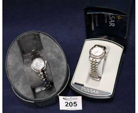 A Pulsar steel ladies wristwatch in original box, together with a Citizen ecodrive titanium WR100 day date ladies steel wrist