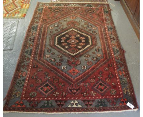 20th Century Hamadan hand knotted carpet having a lozenge shaped field with geometric decoration. 53 x 200cm approx. (B.P. 24