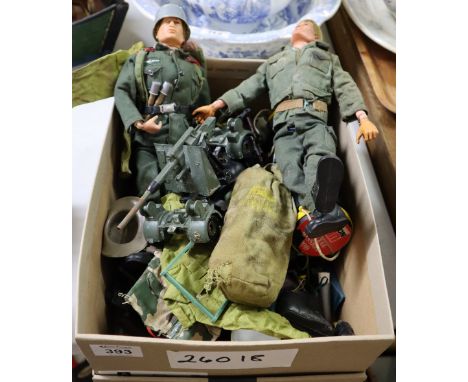 Box containing assorted vintage Action Man items to include; figures, guns and weapons, hats and clothing etc. (B.P. 24% incl