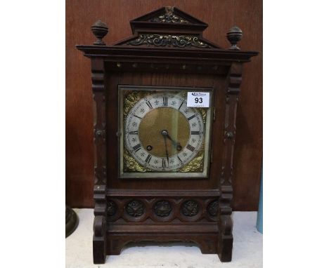 Large early 20th Century oak architectural bracket clock with brass face and silvered Roman chapter ring, two train movement.