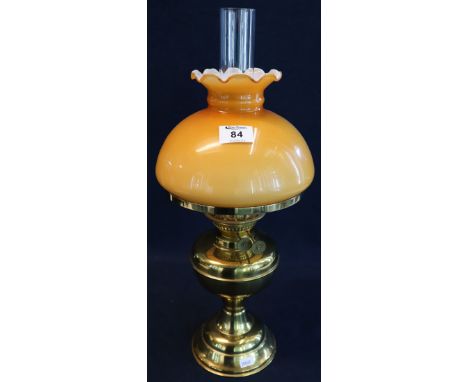 20th Century brass double burner oil lamp with coloured glass shade and clear chimney. (B.P. 24% incl. VAT)