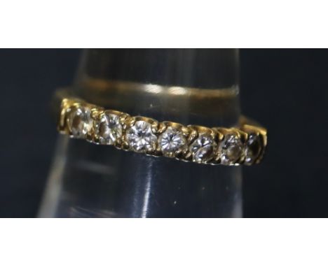 An 18ct gold and diamond half eternity style ring, 3g approx. (B.P. 24% incl. VAT)