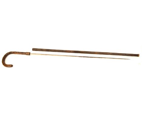 Late 19th / Early 20th Century bamboo sword cane by Wilkinson sword of Pall Mall, with turned coper band to ricasso, square b