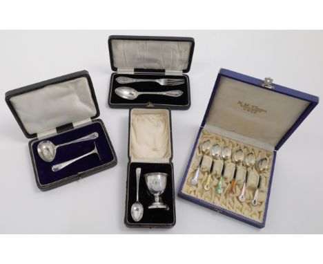 A set of six Norwegian enamelled coffee spoons, stamped 925 SGR, in case marked in lined interior N.M. Thune Solvvaresabrik O