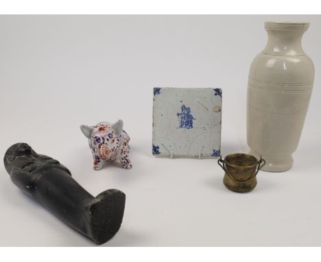 A mixed group of objects of vertu, to include: a blue and white Delft style tile sparsely decorated with a travelling mother 