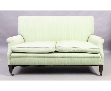 An Edwardian mahogany framed two seat sofa, first quarter 20th century, with green stipe fabric upholstery, raised on square 