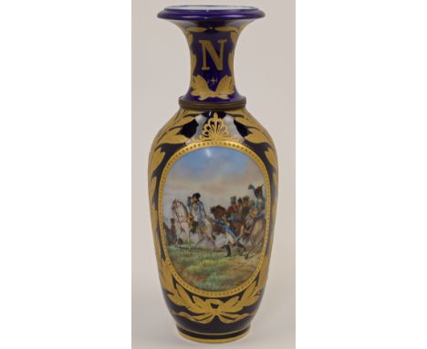 A Sèvres style cobalt blue and gilt decorated baluster vase, 19th century, with central oval cartouches painted with a Napole