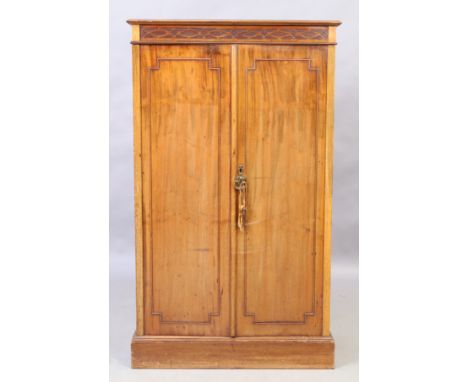 An Edwardian mahogany cupboard, first quarter 20th century, with two doors enclosing shelf space, raised on plinth base, 121c