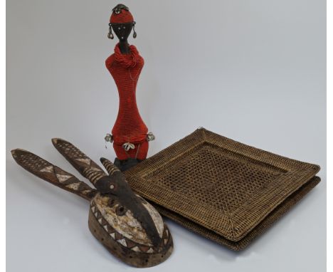 A collection of tribal items, comprising: an African anthropomorphic mask, possibly Mossi, Burkina Faso, with elongated ears 