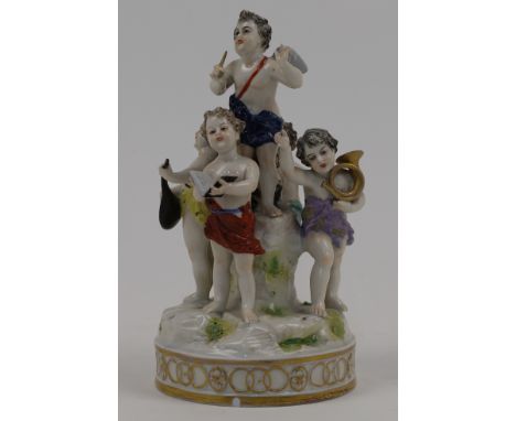 A Dresden style porcelain figure group emblematic of music, late 19th century, featuring five putti holding musical instrumen