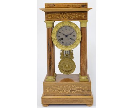 A French rosewood and gilt-metal mounted portico clock, 20th century, with line inlaid columns with gilt-metal mounted capita