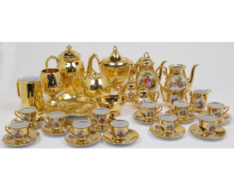 A composite gilded porcelain tea and coffee service, 20th century, makers including Royal Worcester, Crown Devon Fieldings, R