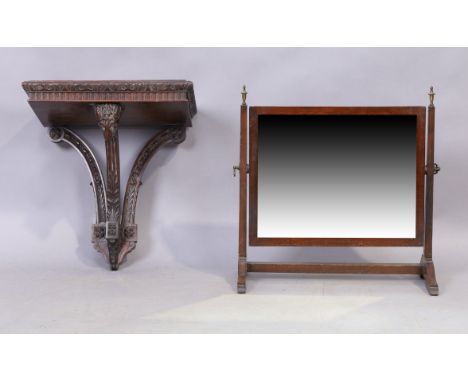 An Adam style mahogany wall bracket, last quarter 19th century, 40cm high, 38cm wide, 25cm deep, together with a mahogany dre