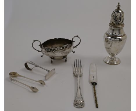 A small group of silver, comprising: a George V sugar caster, Birmingham, 1928, Mappin & Webb Ltd., 16.5cm high; an Edwardian