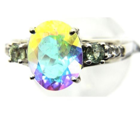 Sterling silver topaz ring with sapphire and topaz set shoulders. Size O/P, 3.7g. P&amp;P Group 1 (£14+VAT for the first lot 