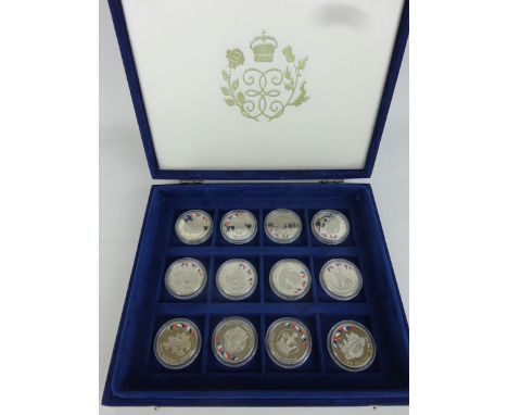 Twelve Westminster Elizabeth II Silver Jubilee silver & enamel proof crowns, boxed,    Condition Report   Click here for furt