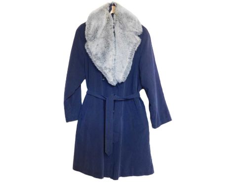 A lady's Windsmoor navy blue trenchcoat, double breasted with belted waist and detachable grey faux fur collar, size 14