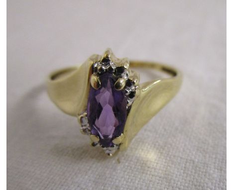 Gold designer amethyst set ring