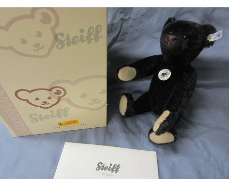 L/E Steiff growler teddy bear in original box with certificate