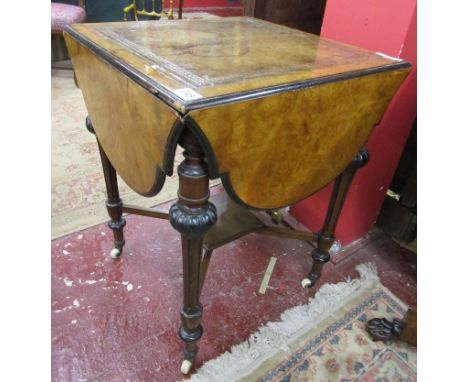 Leather top walnut card table on casters