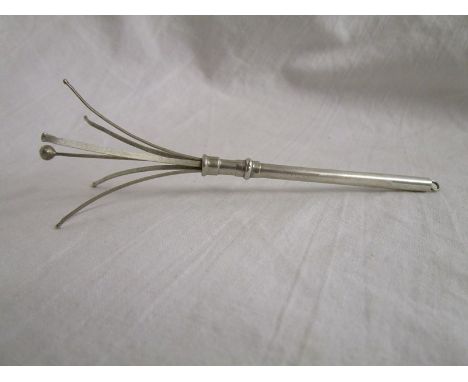 Silver cocktail swizzle stick