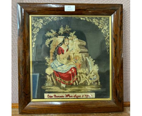 A 19th Century woolwork tapestry, depicting a lady seated at a temple, signed Ellen Bostocks, rosewood and parcel gilt frame